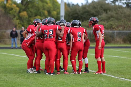 Xavier Clark (52) gives his teammates a brief pep talk. "Unleash Hell ... on my command!!"