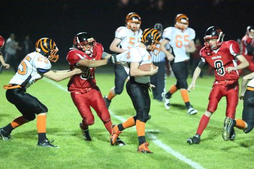 Uriel Liquidano absolutely, positively refuses to let the runner get away. (John Fisken photos)