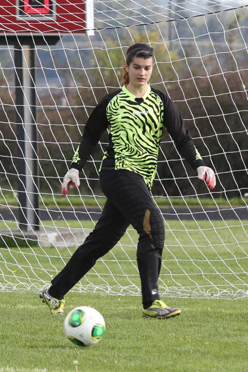 Wolf goalie Joye Jackson keeps spring alive with her natty ensemble.