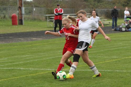 Jennifer Spark interjects herself into the play, one shoulder at a time.