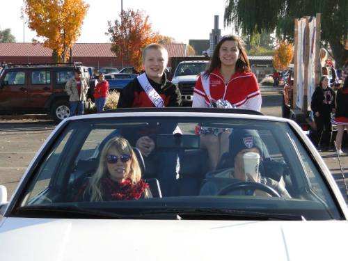 Freshman royalty get transportation from Janine and (camera shy) Mark Bundy.