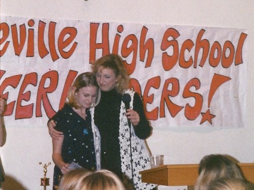Shawn (Evrard) Christensen (left) and Sylvia Arnold during high school cheer days.