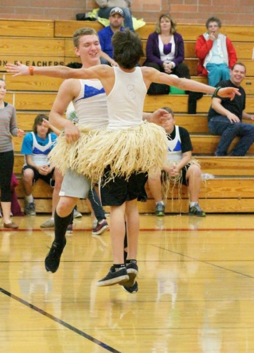 Freshman Gabe Wynn chest bumps a teammate after a dramatic point. (ST)