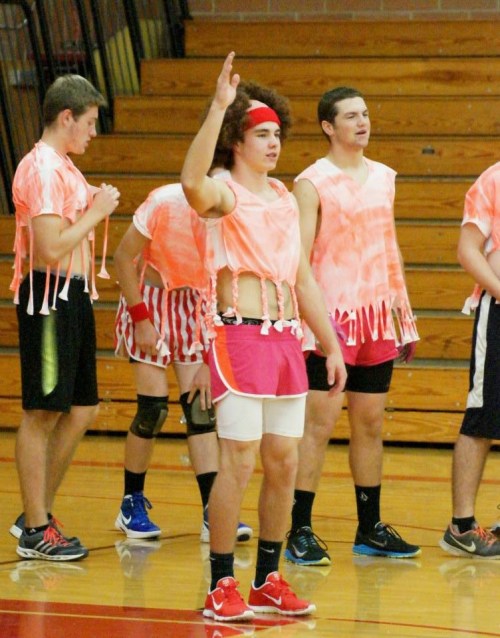 Junior Josh Bayne sends the fans out the door. "Good night folks! Drive home safely!" (ST)