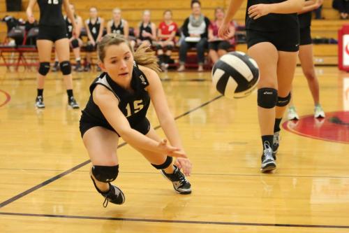 Valen Trujillo sells out completely in pursuit of the ball.