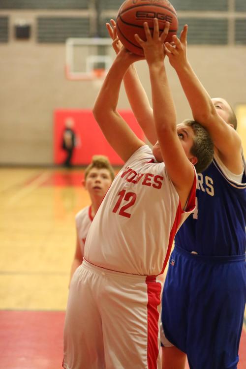 Jake Pease battles for a rebound.