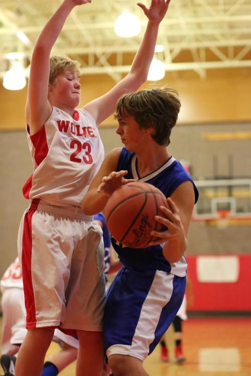 Ben Olsen invades some personal space while playing defense for CMS. (John Fisken photos)