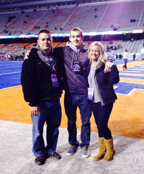 Jake Tumblin and parents Chris and Shannon hang out in the end zone. (Madison Tisa McPhee photo)