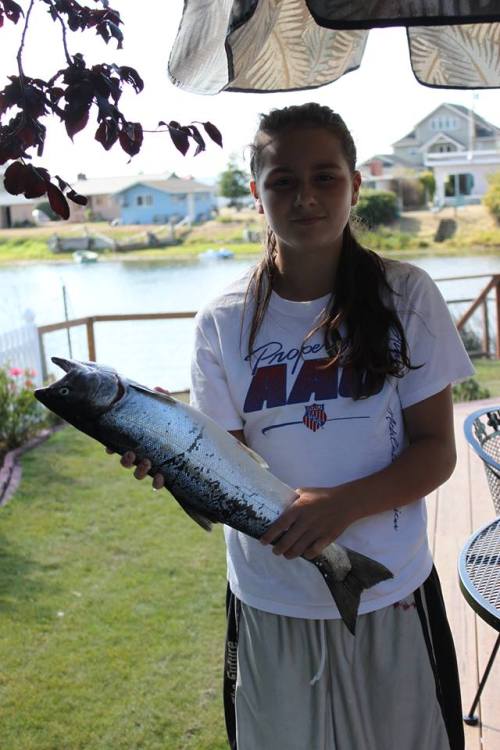When she's not catching fish, Mia Littlejohn is fairly good at snagging soccer balls shot at her, as well. (Dawn Hesselgrave photo)