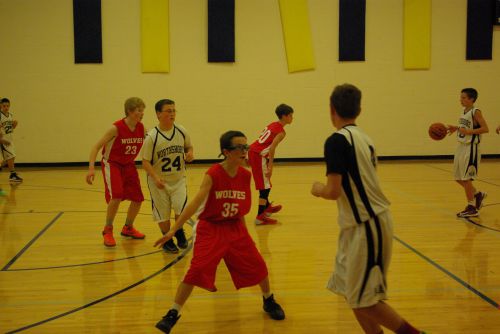 Wolves (l to r) Ben Olsen, Nick Etzell and Luke Merriman apply defensive pressure. (Joe Lippo photo)