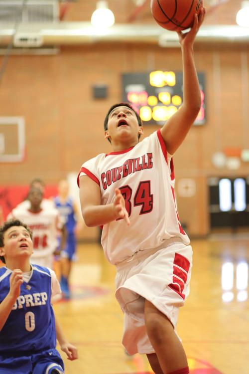 Uriel Liquidano completes a coast-to-coast sprint with a layup.