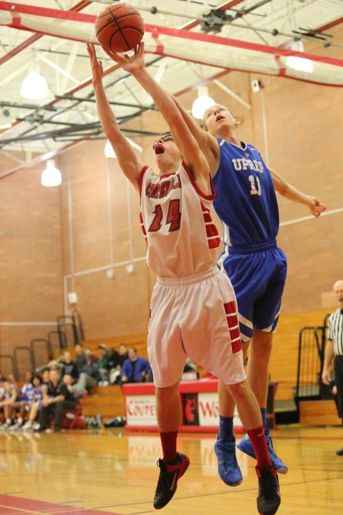 Jared Helmstadter goes all-out for a rebound.