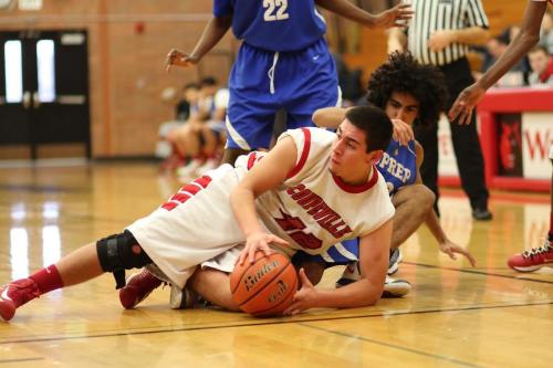 Oscar Liquidano fights for a loose ball.
