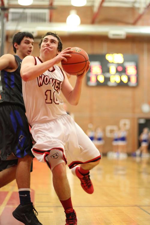 Aaron Trumbull leans in as he negotiates for room to get off a shot.