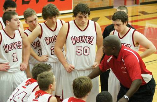 Wolf coach Anthony Smith rallies the troops.