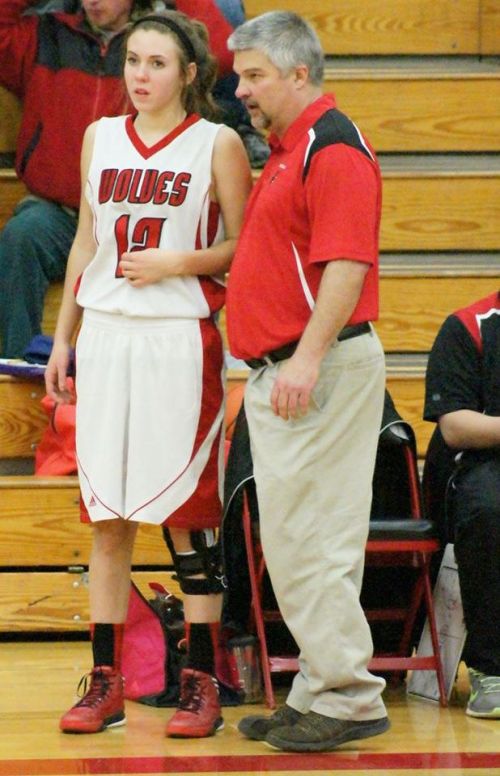 Julia Myers gets some in-game strategy from Wolf coach David King. (Shelli Trumbull photo)