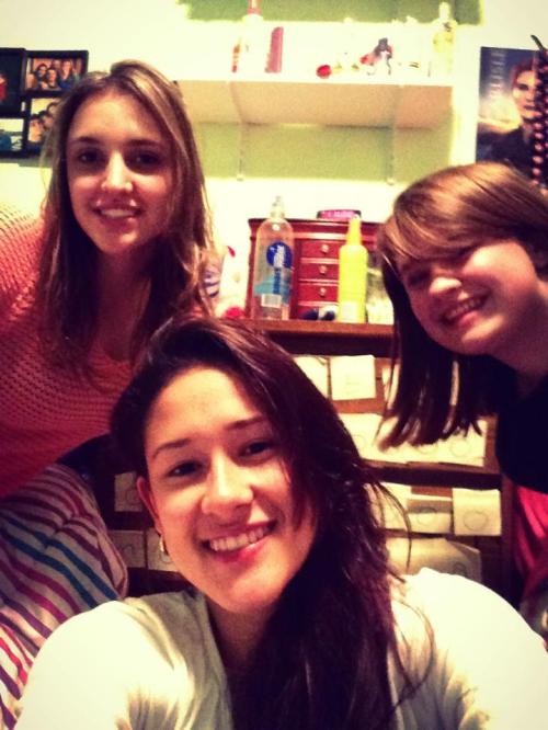 Aura Corredor (center) with fellow basketball player Sophia Jebrail (left) and CHS cheerleader Camilla Rische.