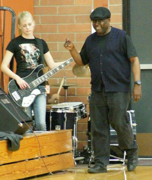 Jamar Jenkins (right) is smiling because he knows bass-playing rock goddess Savanna Dohner will one day be selling out arenas, and hopefully she'll remember him. (Shelli Trumbull photos)