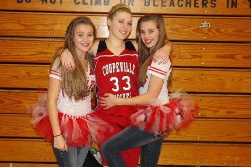 Tiffany Briscoe hangs out with her own personal cheerleaders.