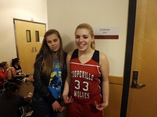 Wolf freshman Tiffany Briscoe (33) hangs out with sister Kyla, who will soon suit up for the CMS 8th grade squad. (Amy Briscoe photos)