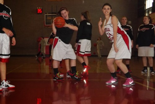 Emily Coulter (middle) and Sophia Jebrail (right), deadly serious about learning the game.