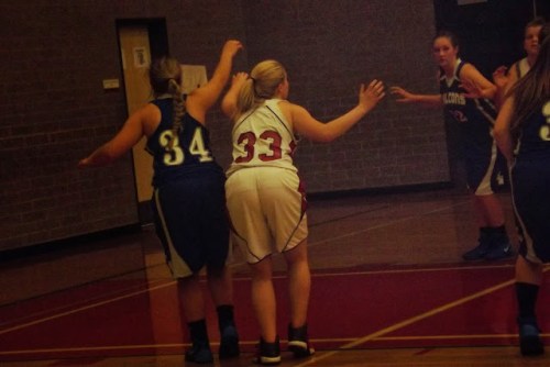 Tiffany Briscoe blocks out on a free throw attempt.