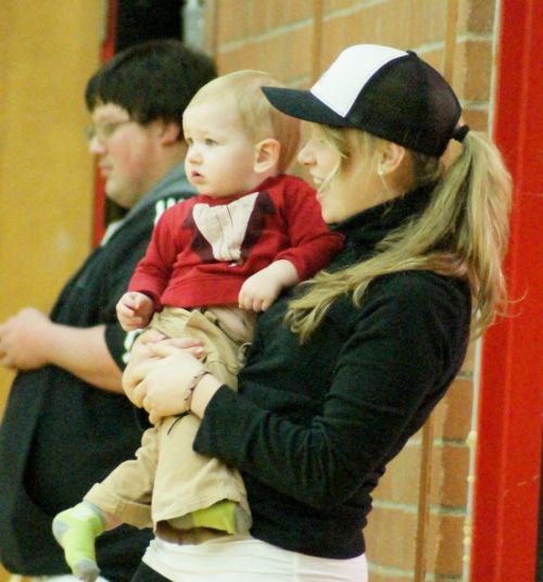 Taking a brief rest with bodyguard/personal assistant Alexis Trumbull.