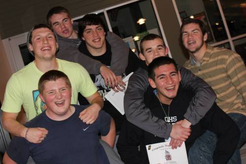 Risner (bottom left) and other captains from the CHS squad celebrate during the team's awards dinner in the fall. (Sylvia Arnold photo)