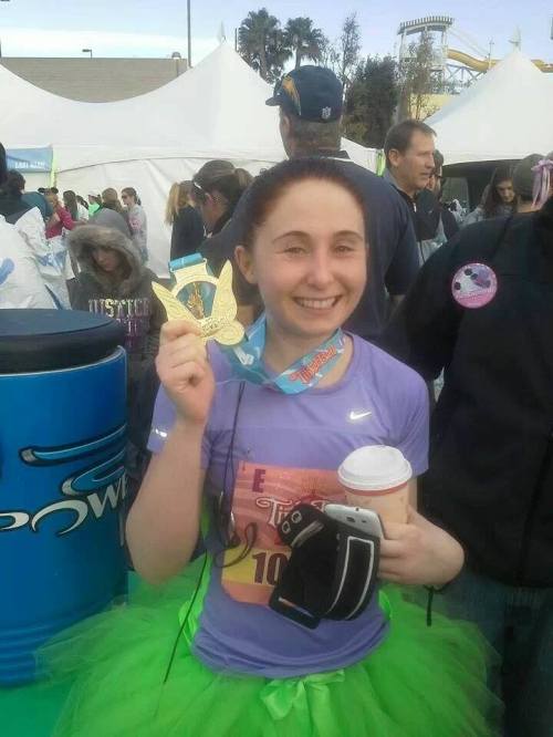 Emily Norris, post-race, with award (and coffee).