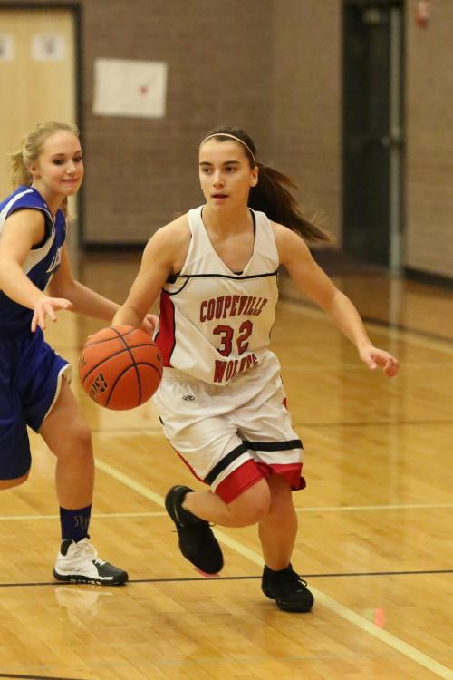 Mattea Miller brings the ball up-court under pressure.