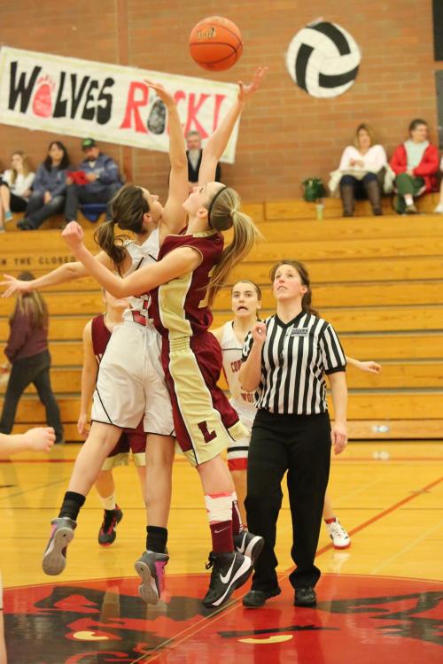 Sophia Jebrail (left) gets some air under her as she goes up for the opening tip.