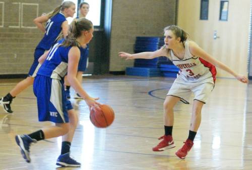 Lauren Grove (right) lays down The Stare O' Death on Mt. Vernon Christian. (Shelli Trumbull photo)
