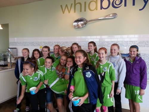 The GU14 Whidbey Islanders soccer squad celebrates at Whidberry Frozen Yogurt. (Dawn Hesselgrave photo)