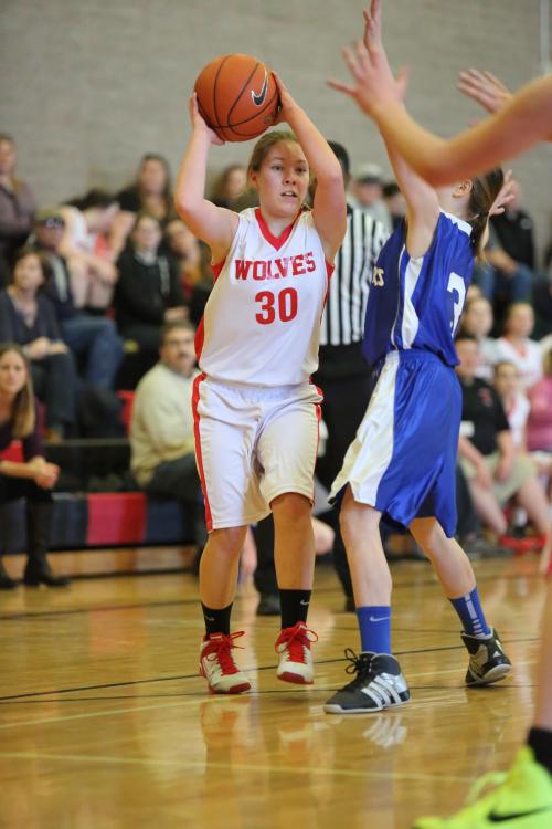 Lauren Rose, a key member of the CMS 8th grade varsity, looks to pass in an earlier season game. (John Fisken photos)