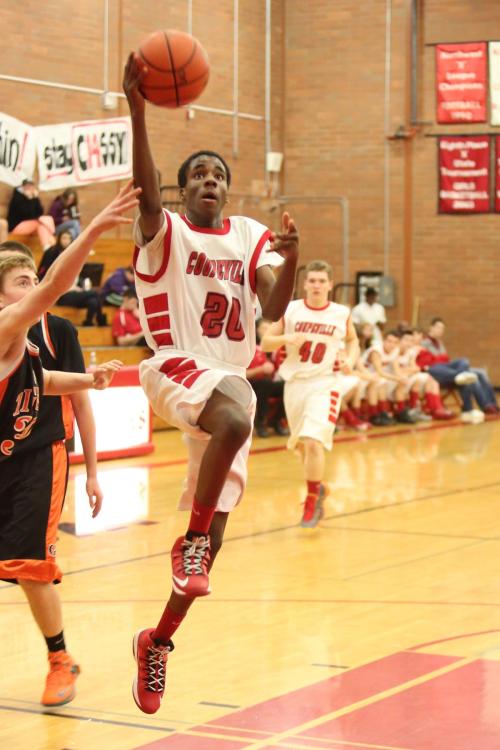 DeAndre Mitchell floats through the paint. (John Fisken photos)