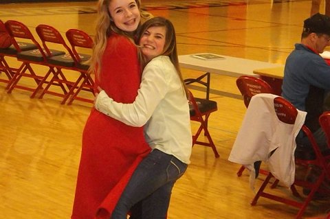 Kiel and LeVine hug it out.