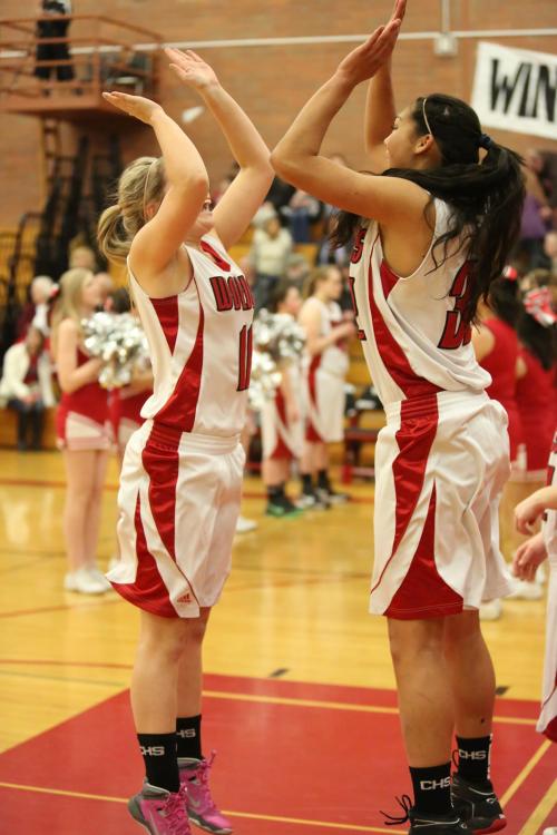 Breeanna Messner (left) and Stone are excited to see each other during pre-game festivities.