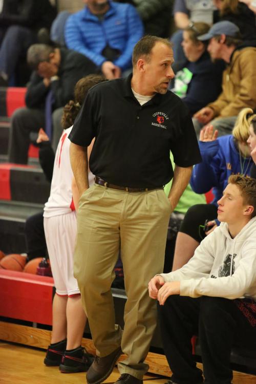 7th grade coach Bob Martin works the sidelines during Monday's home game.