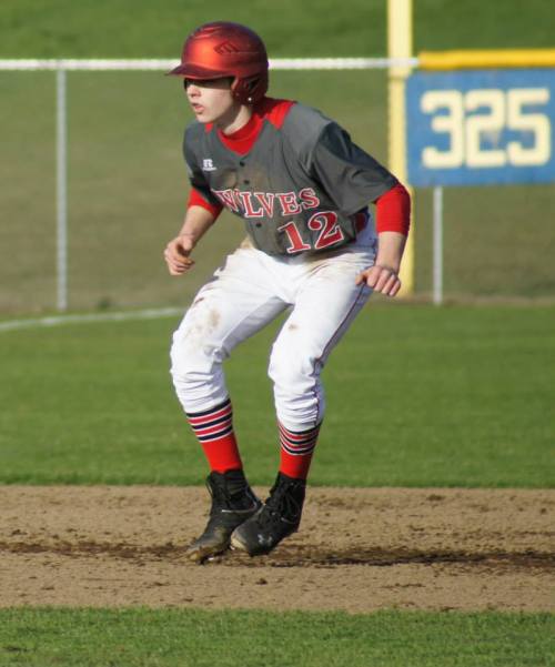 Josh Bayne tiptoes along the baseline, daring the pitcher to run him back to the bag.