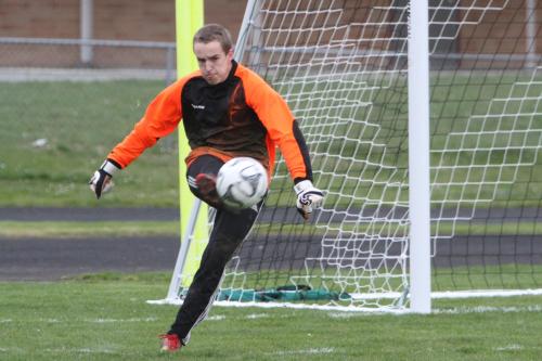 Wolf goalie Joel Walstad clears the ball.