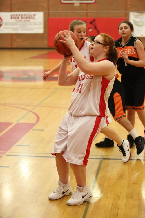 Shelby Montoya stops and pops while teammate Allison Wenzel is