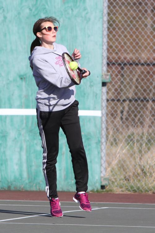 Micky LeVine nails a picture-perfect volley. (John Fisken photos)