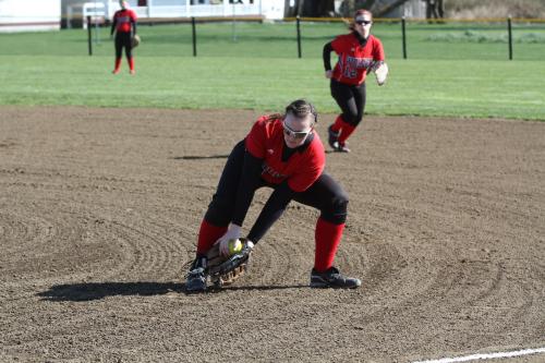 Hailey Hammer makes the snag at first, while Emily Coulter charges in to back her up.