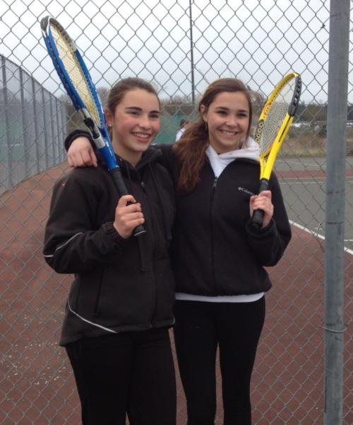 Samantha Martin (left) and Sydney Aparicio celebrate their win at #1 doubles. (Tami Aparicio photo)