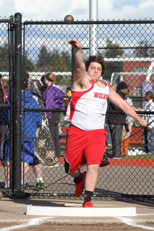 Nick Streubel erupts with a spectacular throw during the shot put competition.