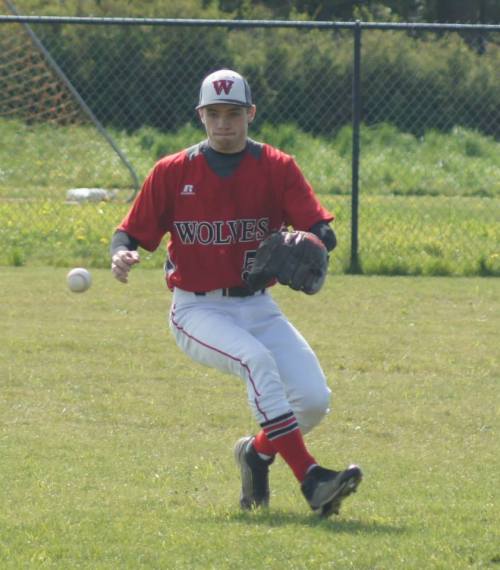 Kurtis Smith charges a ball. (Shelli Trumbull photo)