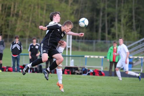 Jared Dickson launches himself in pursuit of the ball.