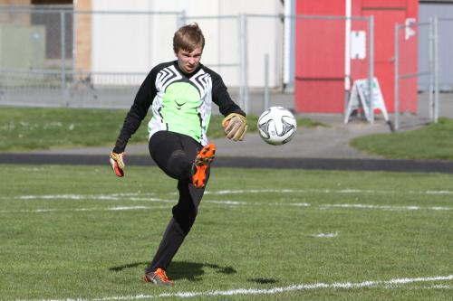 Wolf goalie Connor McCormick clears the ball.