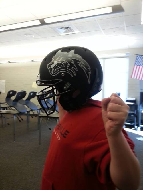 Sawyer Maggio models the new CHS football helmets. (Tony Maggio photo)