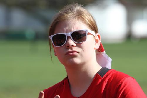 Madeline Strasburg, AKA Maddie Big Time, was a lot wetter Wednesday, but did get a brownie after thumping a two-run double. (John Fisken photo)